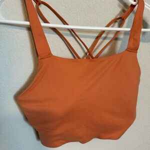Coral strappy sports bra